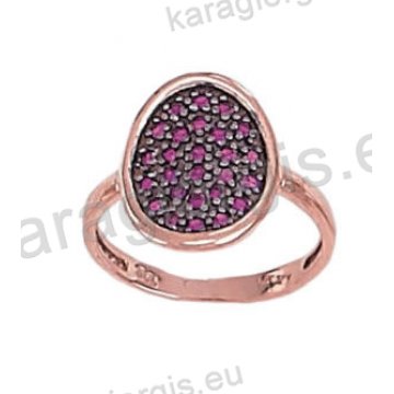 Δαχτυλίδι σε ροζ χρυσό με κόκκινες πέτρες ζιργκόν και μαύρο χρυσό