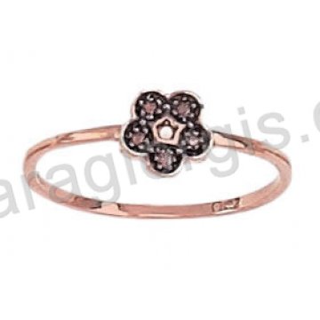 Δαχτυλίδι από ροζ χρυσό τύπου chevalier σε σχήμα μαργαρίτας με μαύρες πέτρες ζιργκόν 