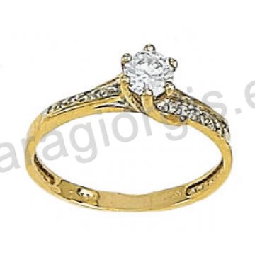Μονόπετρο δαχτυλίδι δίχρωμο χρυσό με λευκόχρυσο σε σχήμα φλόγας με άσπρες πέτρες ζιργκόν στα πλαϊνά