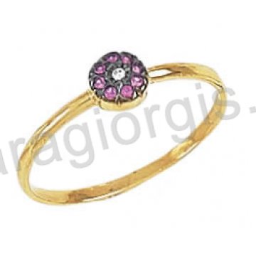 Δαχτυλίδι χρυσό Κ14 μοντέρνο σε σχήμα ροζέτας με κόκκινες πέτρες ζιργκόν και μαύρο πλατίνωμα