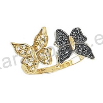 Μοντέρνο εντυπωσιακό δαχτυλίδι Κ14 χρυσό με πεταλούδες με άσπρες και μαύρες πέτρες ζιργκόν και μαύρο πλατίνωμα