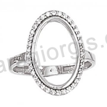 Μοντέρνο δαχτυλίδι λευκόχρυσο Κ14 σε σχήμα κύκλου με άσπρες πέτρες ζιργκόν