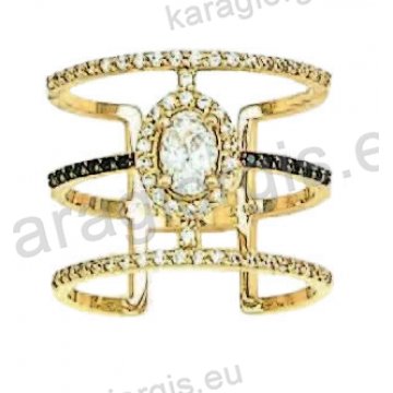 Δαχτυλίδι χρυσό Κ14 fashion με λευκόχρυσο σε μοντέρνο σχεδιασμό μαύρο χρυσό με άσπρες και μαύρες πέτρες ζιργκόν.