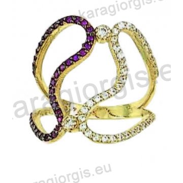 Δαχτυλίδι χρυσό Κ14 fashion με λευκόχρυσο σε μοντέρνο σχεδιασμό μαύρο χρυσό με άσπρες και κόκκινες πέτρες ζιργκόν.