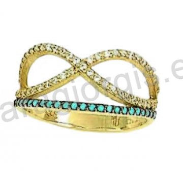 Δαχτυλίδι χρυσό Κ14 fashion με λευκόχρυσο σε μοντέρνο σχεδιασμό μαύρο χρυσό με άσπρες και σιέλ πέτρες ζιργκόν.