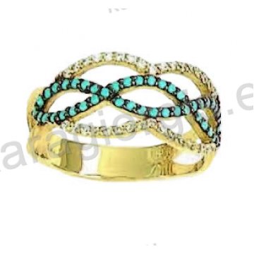 Δαχτυλίδι χρυσό Κ14 fashion με λευκόχρυσο σε μοντέρνο σχεδιασμό μαύρο χρυσό με άσπρες και σιέλ πέτρες ζιργκόν.