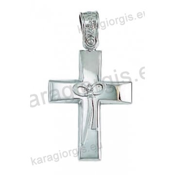 Βαπτιστικός σταυρός για κορίτσι λευκόχρυσος με ένθετο φιογκάκι λουστρέ φινίρισμα με άσπρες πέτρες ζιργκόν.