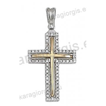 Βαπτιστικός σταυρός για κορίτσι σε λευκόχρυσο με ένθετο χρυσό σταυρό σε λουστρέ φινίρισμα και άσπρες πέτρες ζιργκόν.