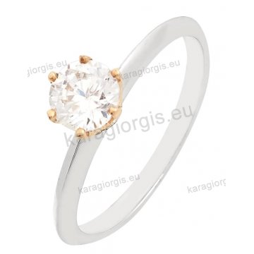 Μονόπετρο δαχτυλίδι αρραβώνα λευκόχρυσο Κ14 σε αμερικάνικο δέσιμο με ρόζ χρυσό και πέτρα ζιργκόν.