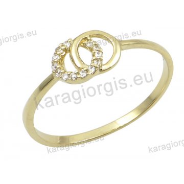 Δαχτυλίδι γυναικείο χρυσό Κ14 με κύκλους με άσπρες πέτρες ζιργκόν.