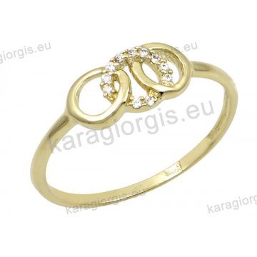 Δαχτυλίδι γυναικείο χρυσό Κ14 με κύκλους με άσπρες πέτρες ζιργκόν.