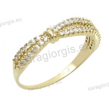 Δαχτυλίδι γυναικείο χρυσό Κ14 σε χιαστί με άσπρες πέτρες ζιργκόν.