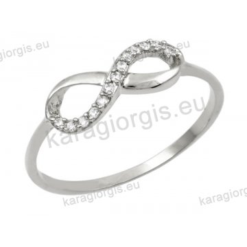 Δαχτυλίδι γυναικείο λευκόχρυσο Κ14 με άπειρο με άσπρες πέτρες ζιργκόν.